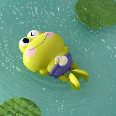 jouet de baignoire bébé grenouille vert clair dans l_eau