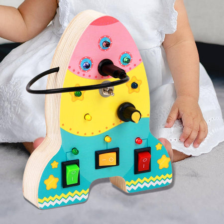 jouet montessori fusée bebe assis